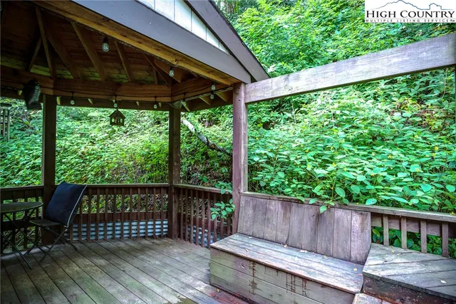 a view of a car park in front of a house