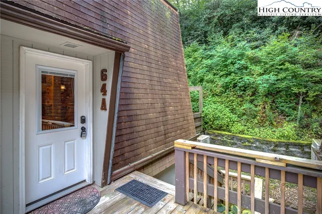 a view of a street with stairs and wooden stairs