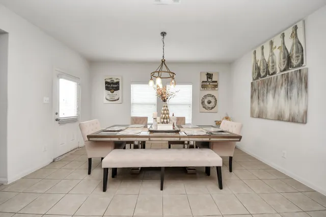a view of a table and chairs in a room