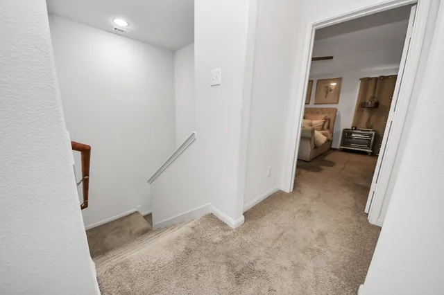 a view of a hallway with closet