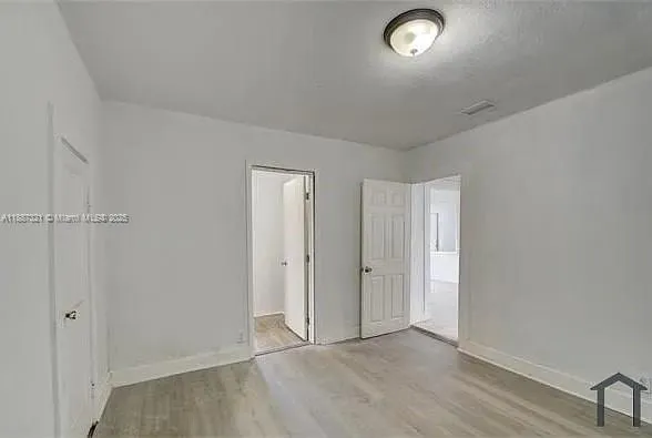 a bathroom with a toilet sink and bathtub