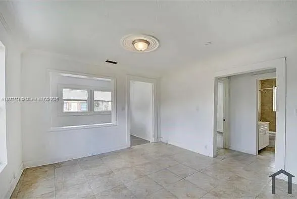 a kitchen with a stove and a microwave