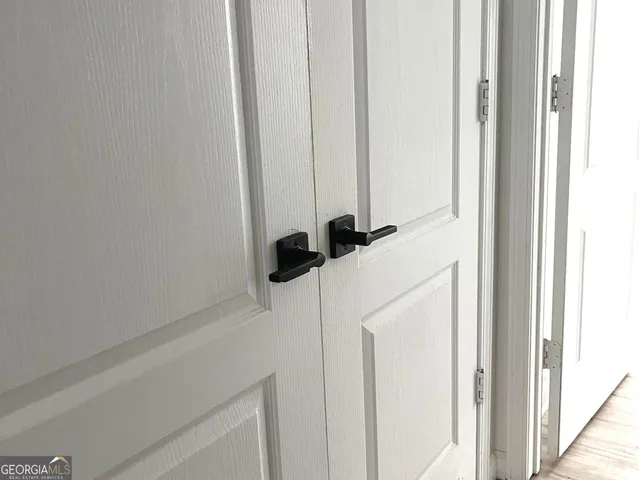 a bathroom with a shower and a sink