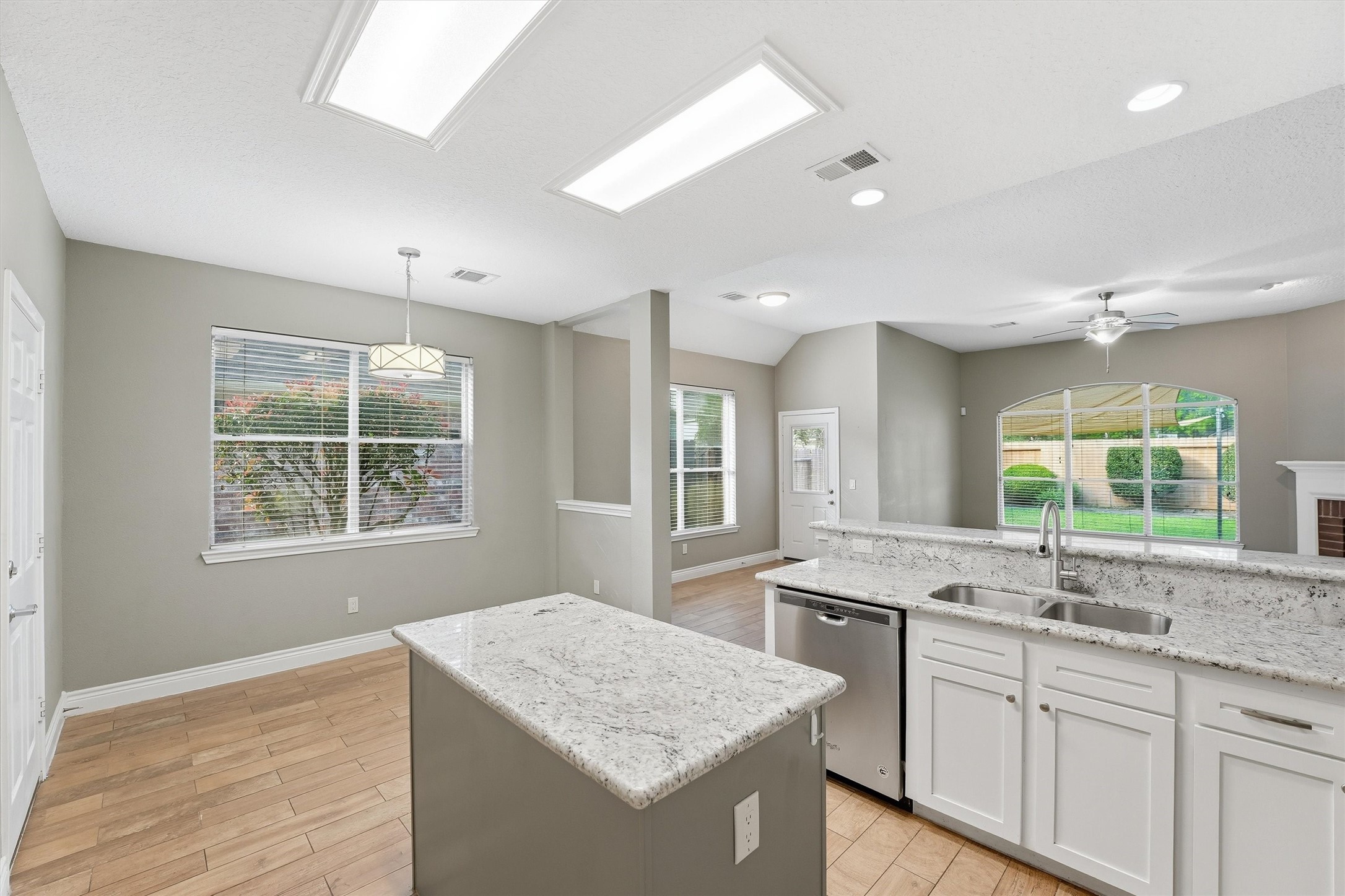 5719 Walkabout Way Katy, TX 77450 - Photo 11 of 25 The island becomes the hub for meal prep, morning coffee, or casual conversations.