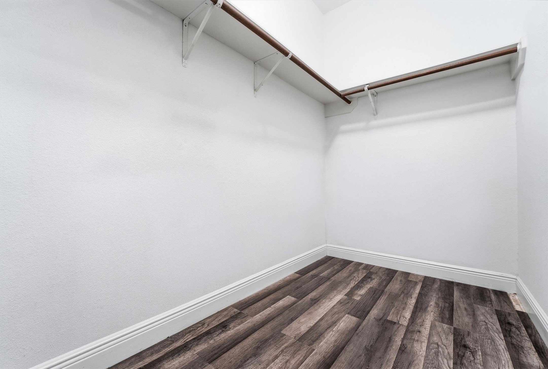 5719 Walkabout Way Katy, TX 77450 - Photo 17 of 25 The large walk-in closet completes the space with room for everything and more.