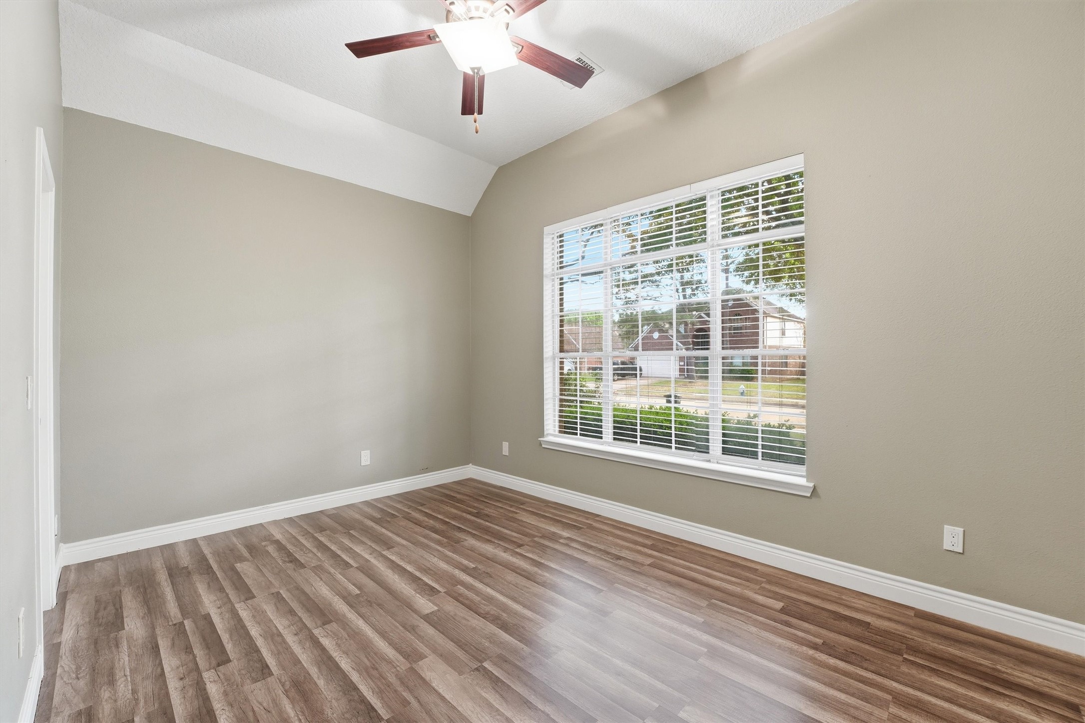 5719 Walkabout Way Katy, TX 77450 - Photo 18 of 25 Both secondary bedrooms are generously sized and filled with natural light thanks to large windows. They offer flexibility for guests, family, or even a home office.