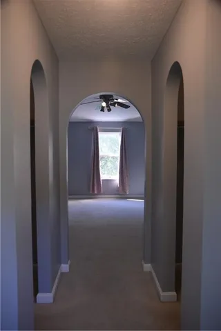 a view of a livingroom with a fan