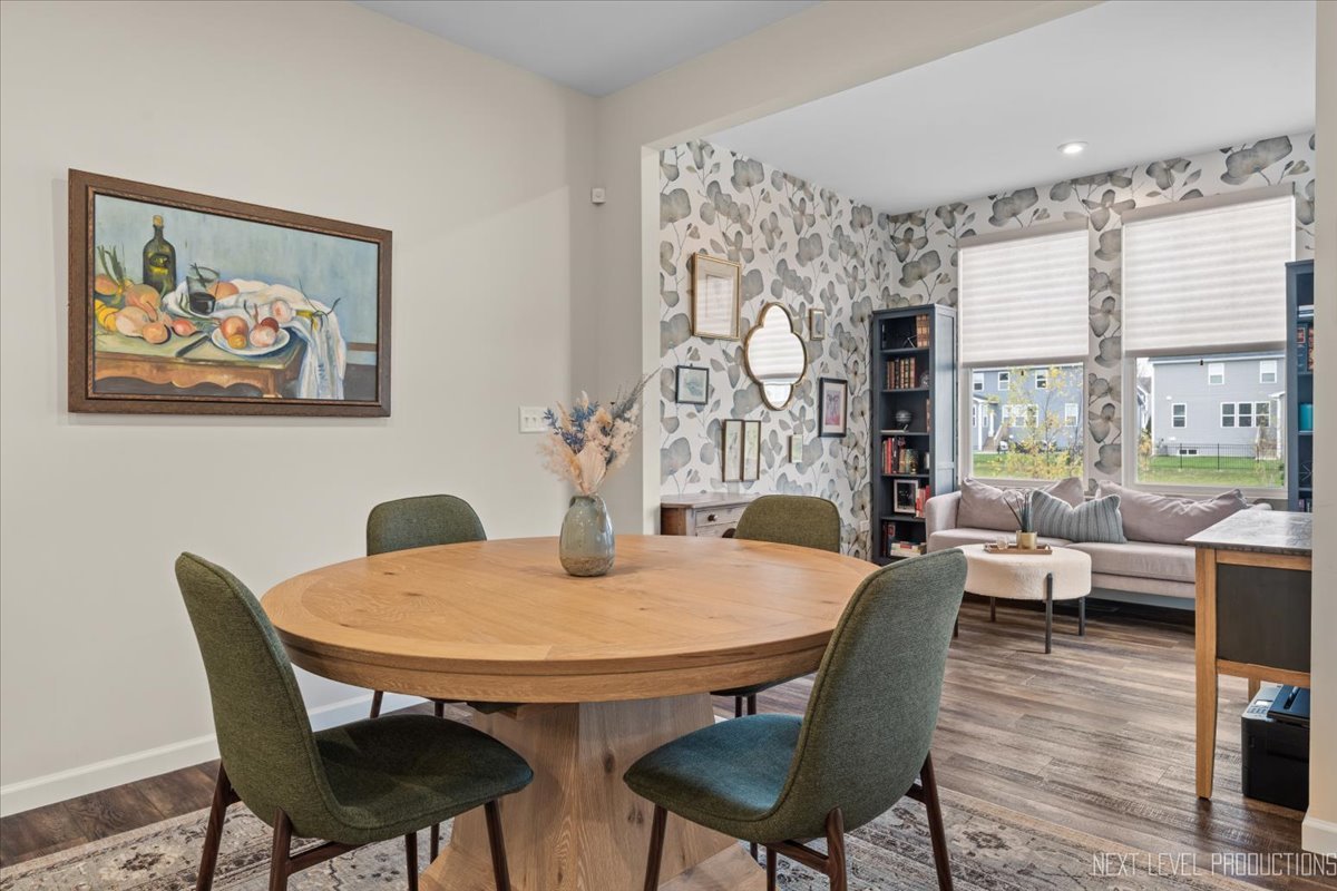 1255 Josiah Road Naperville, IL 60563 - Photo 11 of 39 a view of a dining room with furniture window and wooden floor