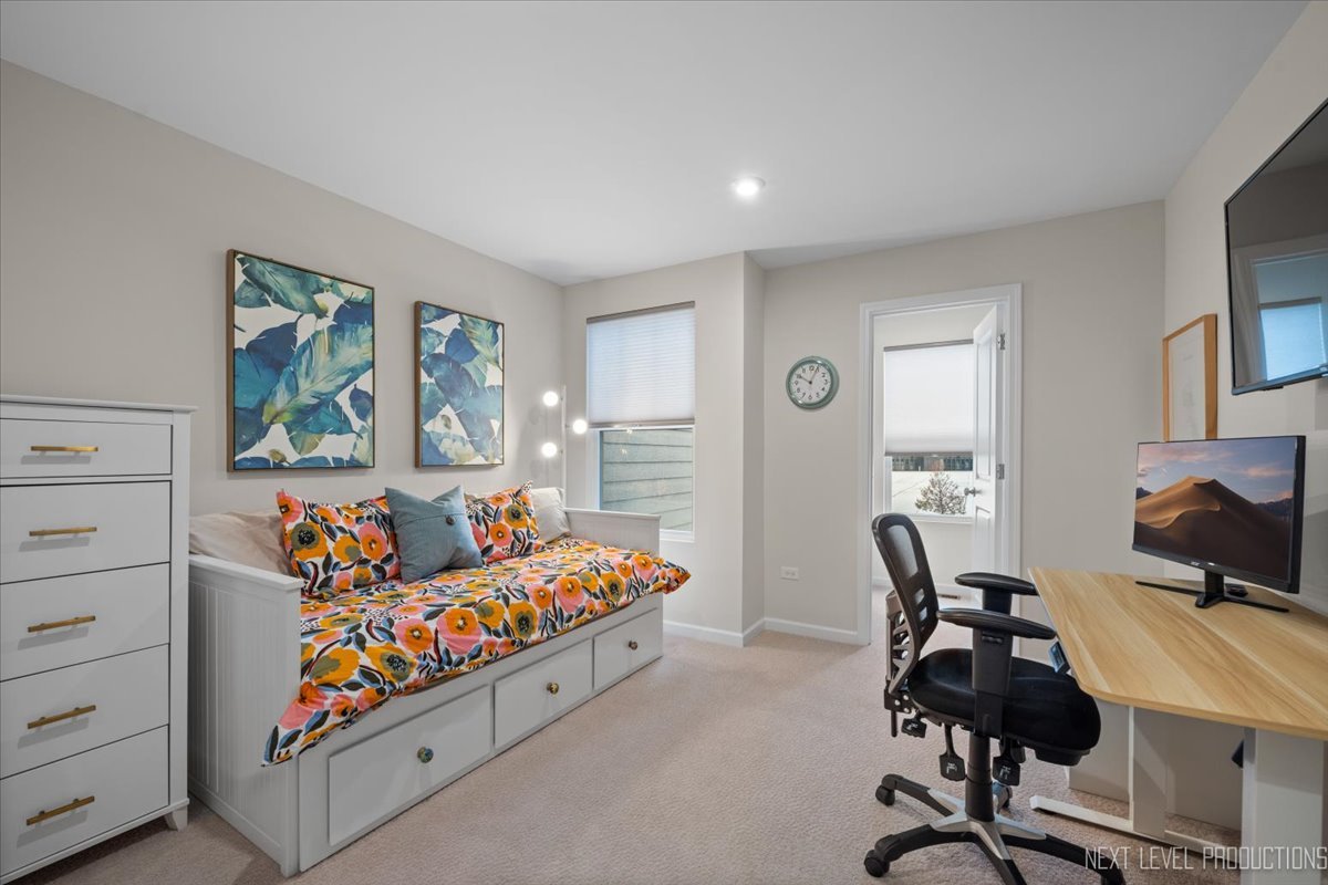 1255 Josiah Road Naperville, IL 60563 - Photo 27 of 39 a bedroom with a bed and furniture