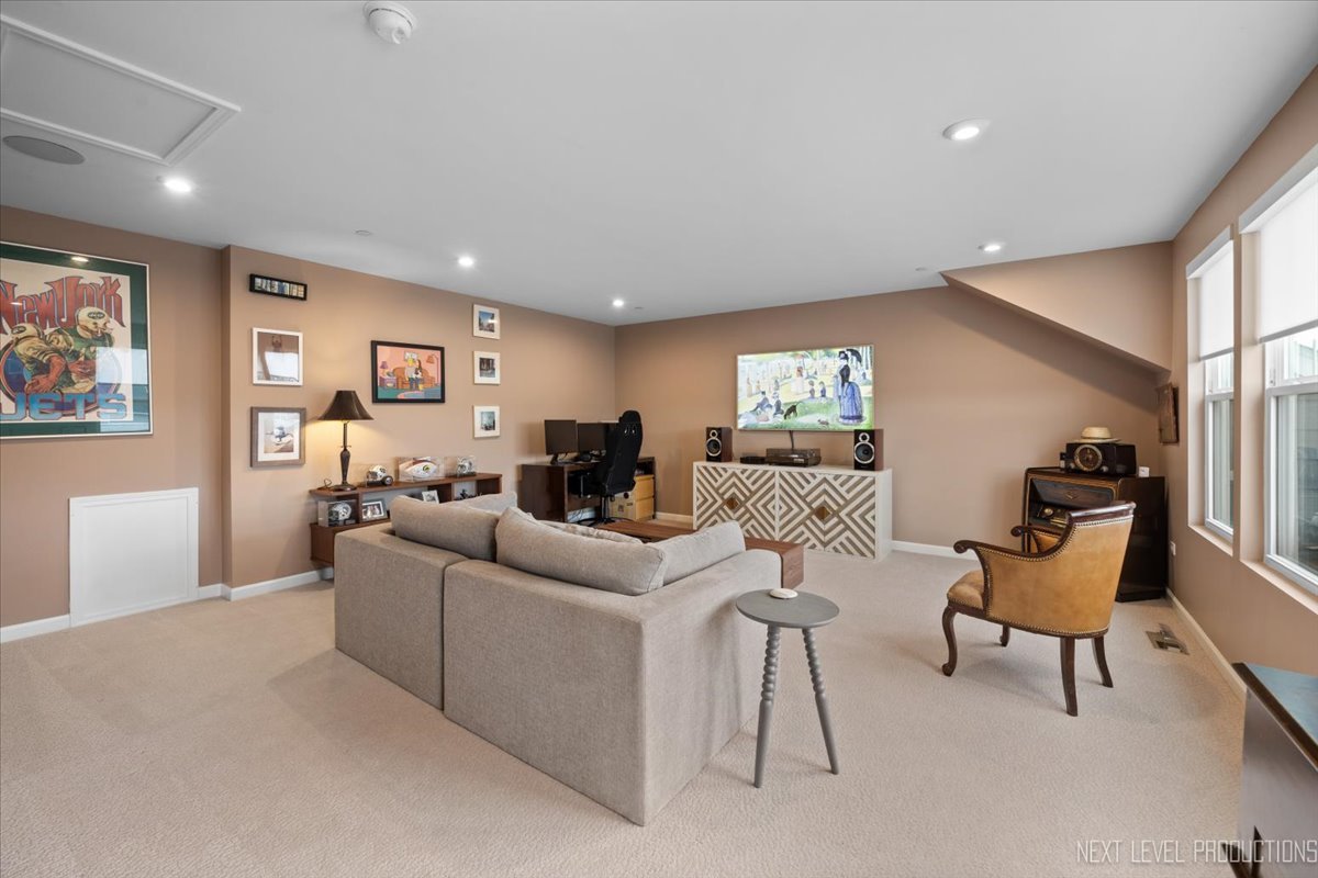 1255 Josiah Road Naperville, IL 60563 - Photo 28 of 39 a living room with furniture and a large window