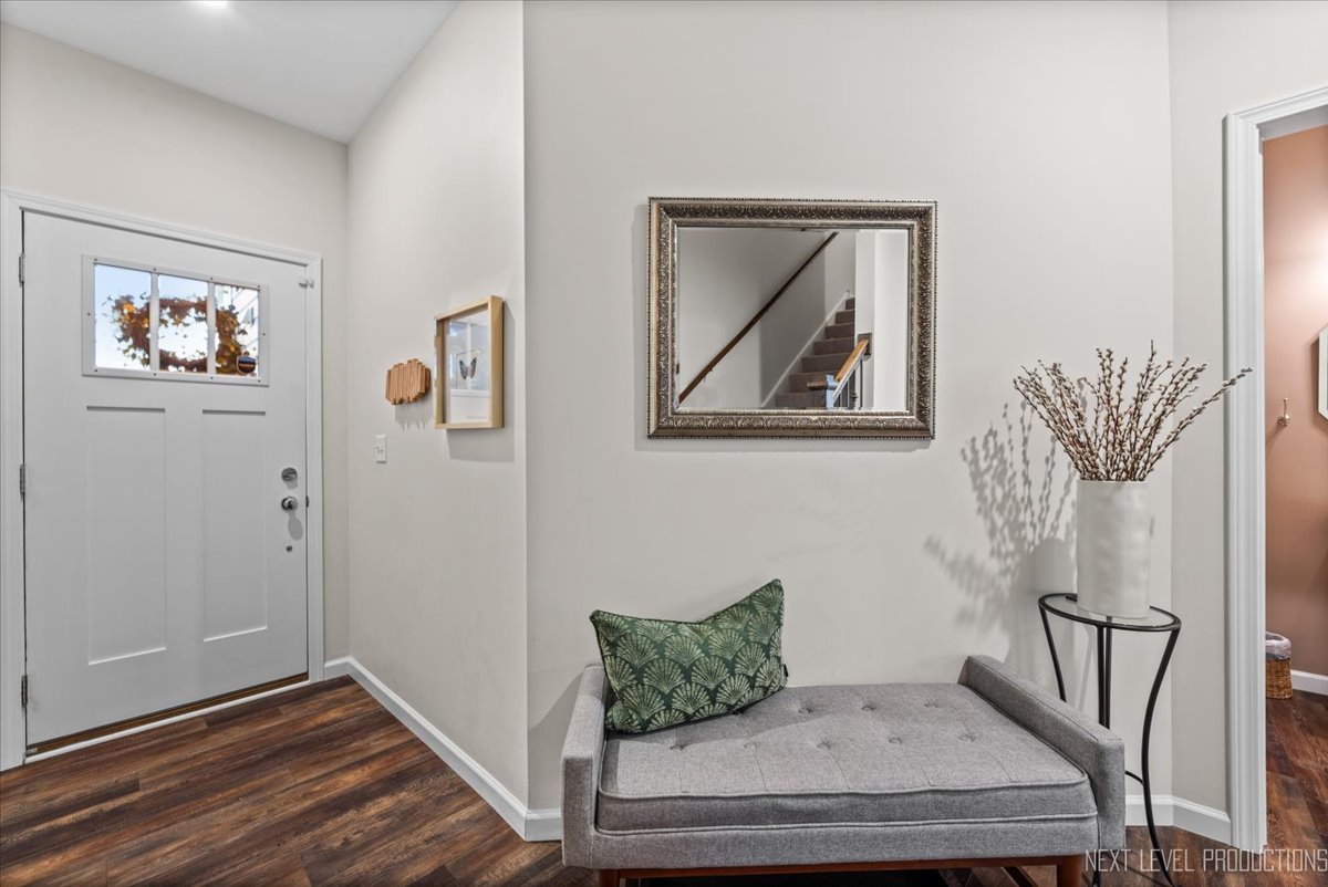 1255 Josiah Road Naperville, IL 60563 - Photo 3 of 39 a view of room with window and wooden floor