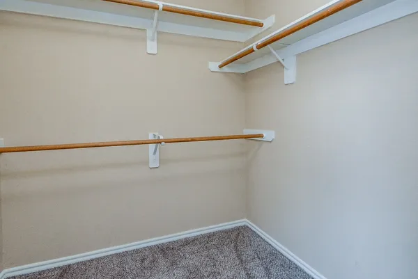 a view of a room with racks on the wall