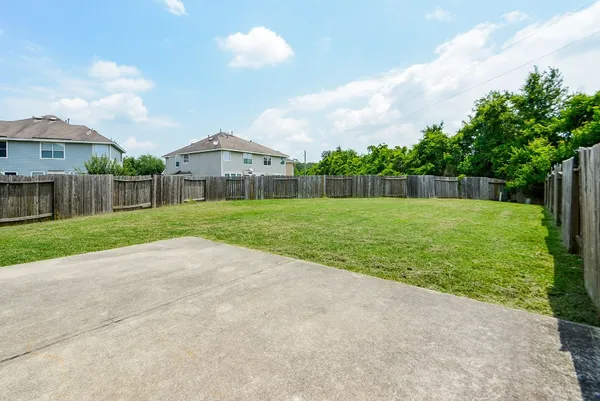 a view of a yard in front of a house