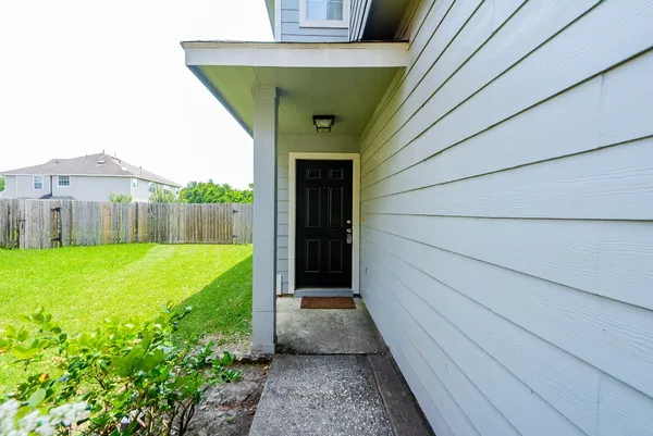 a view of a house with a garden
