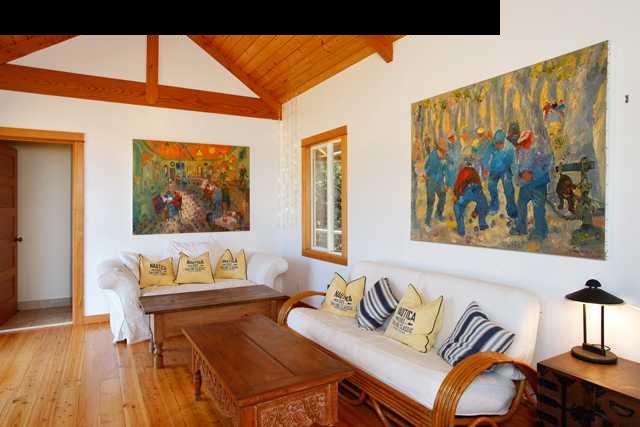 429 Omaopio Road Kula, HI 96790 - Photo 11 of 27 a living room with furniture and wooden floor