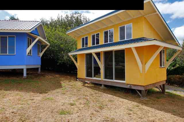 429 Omaopio Road Kula, HI 96790 - Photo 25 of 27 a blue and white house with a large window