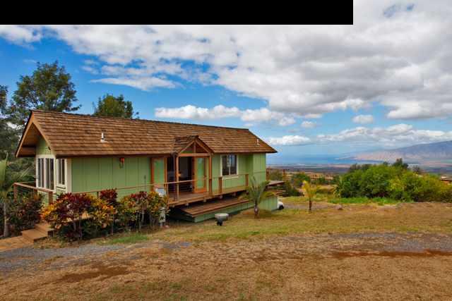 429 Omaopio Road Kula, HI 96790 - Photo 8 of 27 a backyard of a house with barbeque oven table and chairs