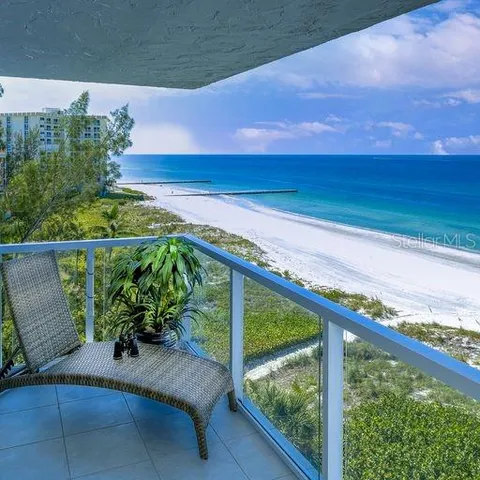 a view of balcony with furniture