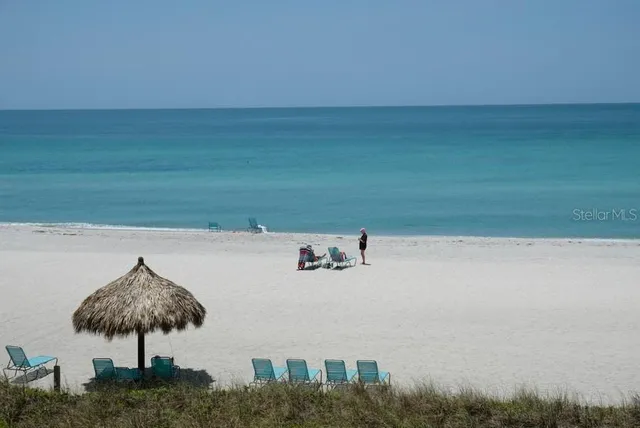 a view of balcony with furniture