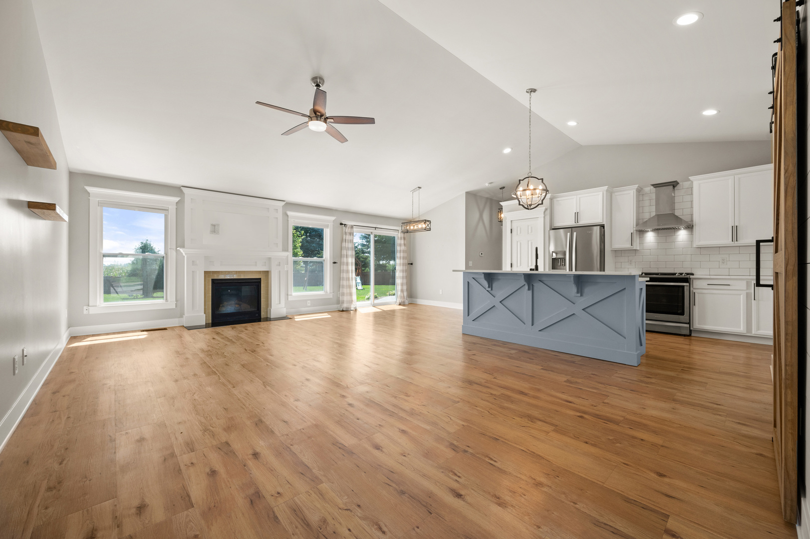 136 Reston Court Sycamore, IL 60178 - Photo 3 of 50 a view of kitchen and hall with wooden floor