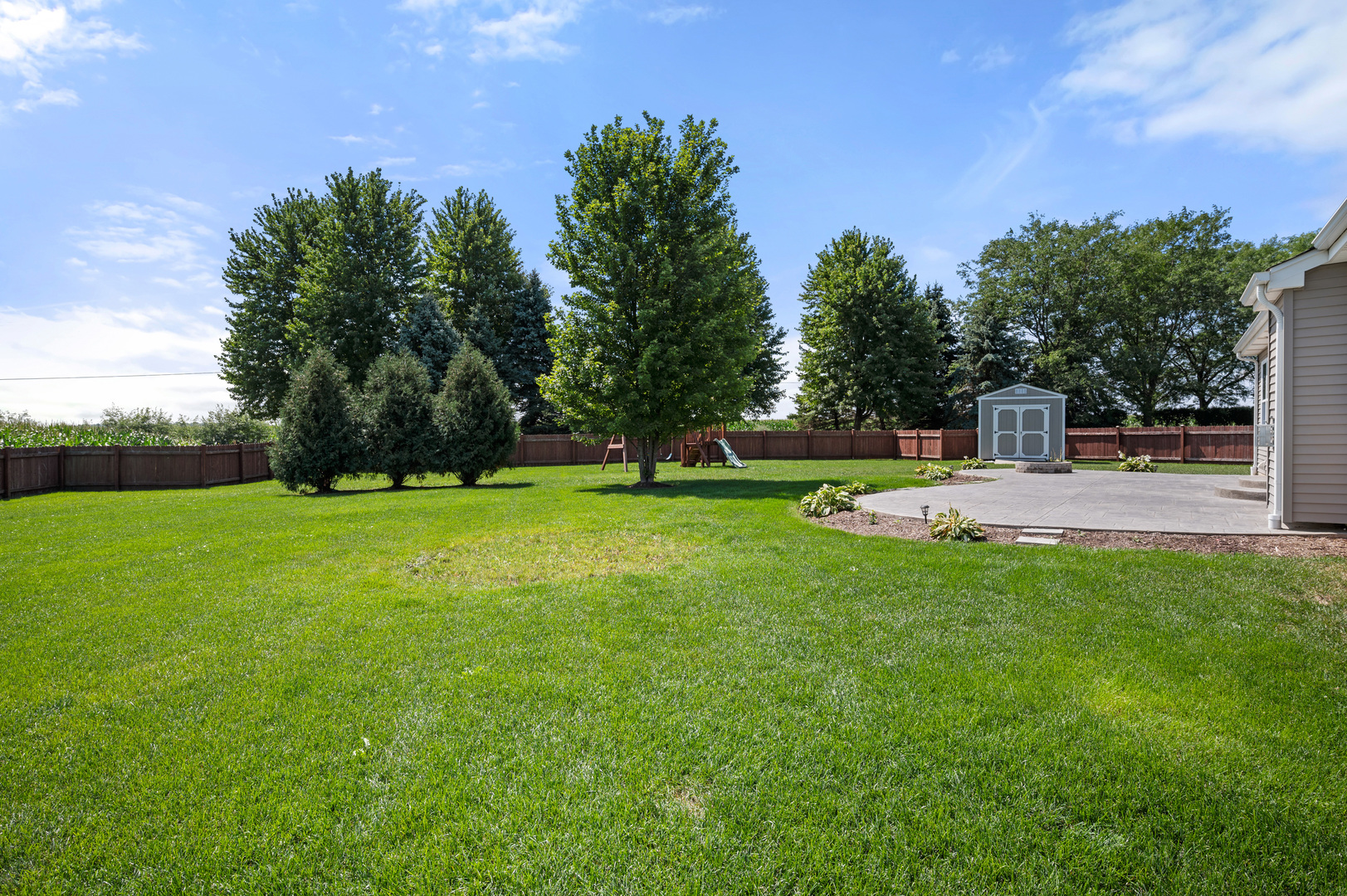 136 Reston Court Sycamore, IL 60178 - Photo 32 of 50 a view of a park with large trees