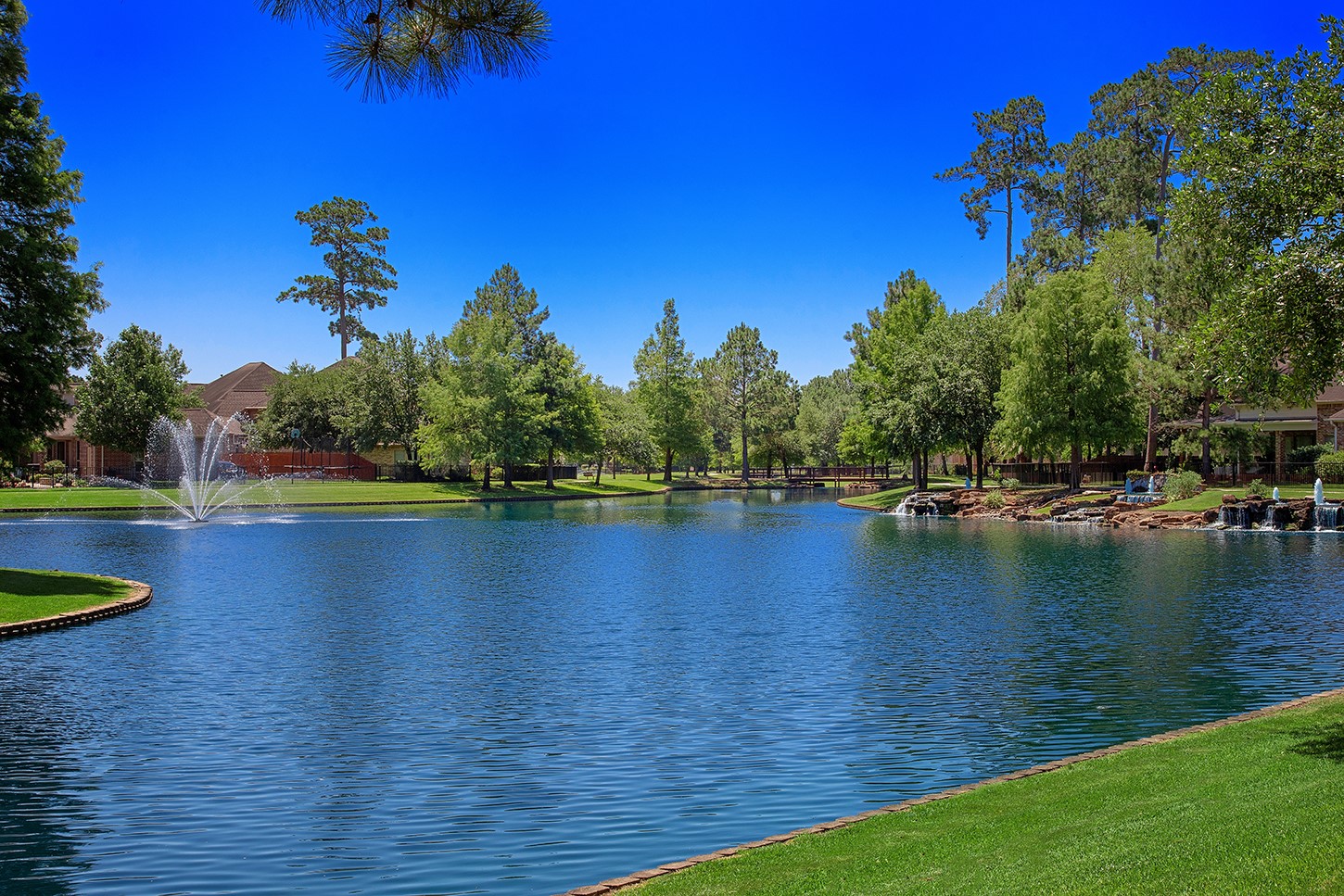 18722 Duke Lake Drive Spring, TX 77388 - Photo 24 of 26 a view of a lake with houses