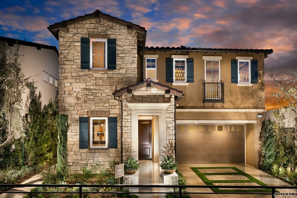 20802 Spruce Circle Porter Ranch, CA 91326 - Photo 1 of 1 Front Elevation: Coral Tuscan. Photos of model home not actual home for sale.