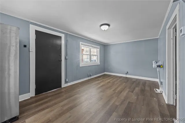 a kitchen with a stove microwave and sink