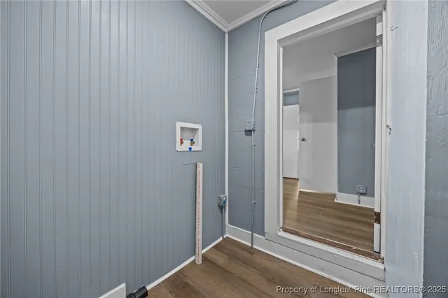 a view of a livingroom with furniture and window