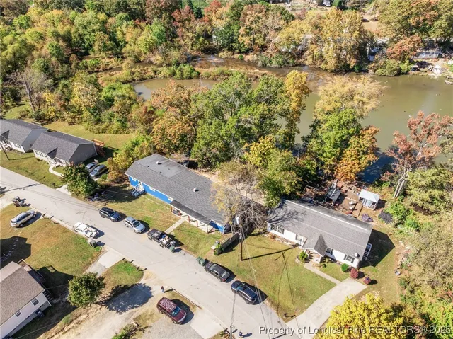 an aerial view of residential house with outdoor space