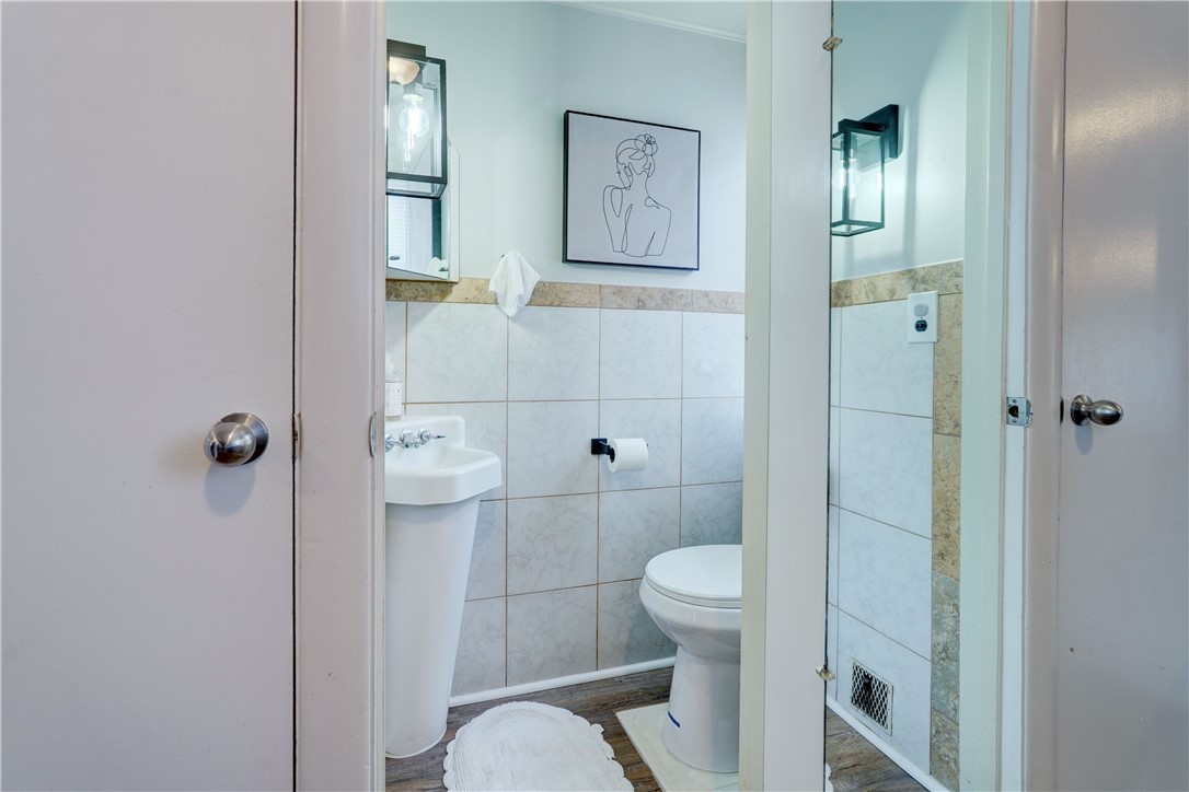 22 Ross Street Rochester, NY 14615 - Photo 12 of 24 1/2 bathroom on first floor