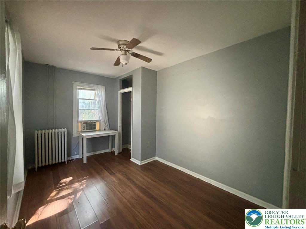 417 McCartney Street, Unit 1 Easton, PA 18042 - Photo 5 of 5 a view of a room with wooden floor fan and windows