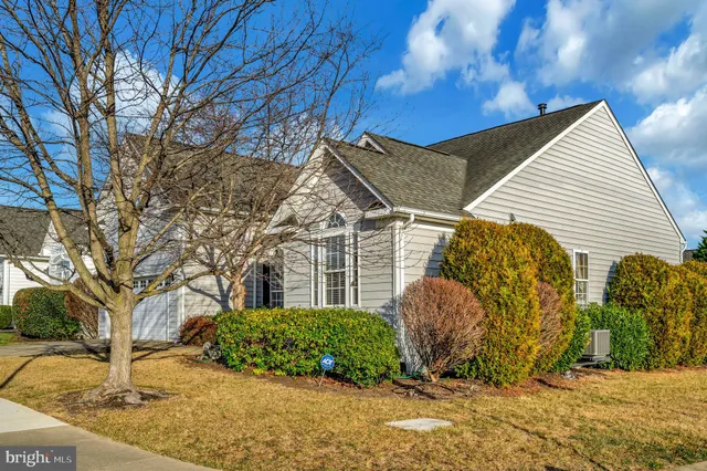 a view of a two chairs on the roof deck