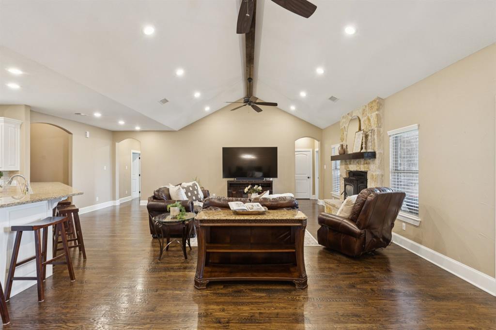 320 Tate Circle Sherman, TX 75090 - Photo 11 of 40 a living room with furniture and a flat screen tv