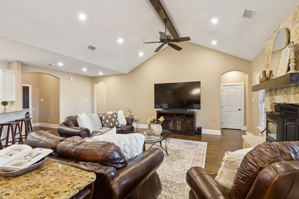 320 Tate Circle Sherman, TX 75090 - Photo 14 of 40 a living room with furniture and a flat screen tv