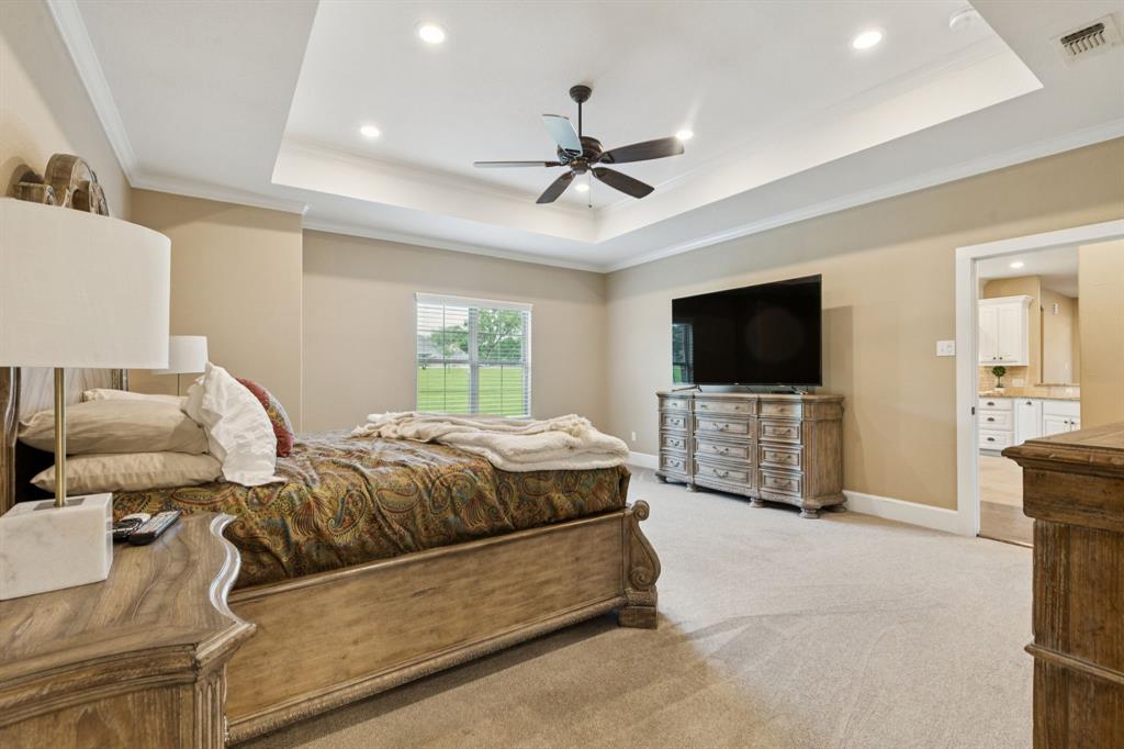 320 Tate Circle Sherman, TX 75090 - Photo 21 of 40 a living room with furniture and a flat screen tv