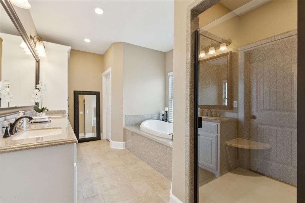 320 Tate Circle Sherman, TX 75090 - Photo 23 of 40 a bathroom with a sink a toilet and shower