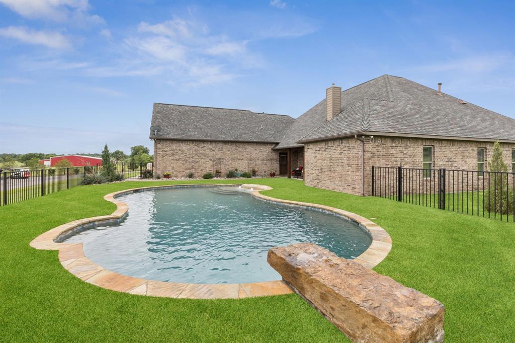 320 Tate Circle Sherman, TX 75090 - Photo 36 of 40 a view of a house with a yard balcony and sitting area