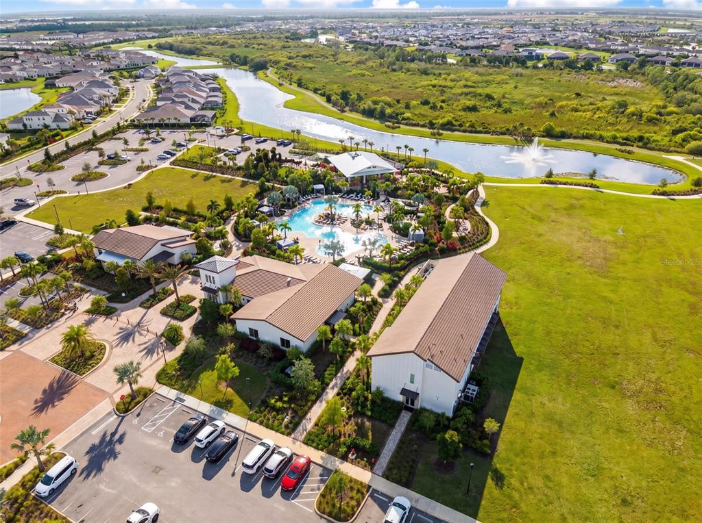 18237 Beach Ranch Terrace Bradenton, FL 34211 - Photo 62 of 72 an aerial view of residential houses with outdoor space