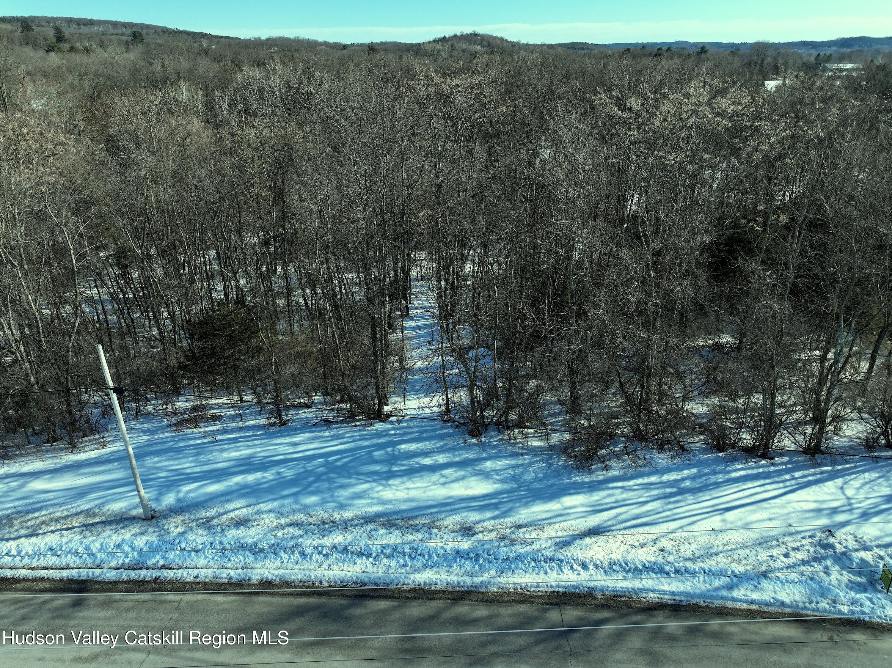 0 Bells Pond Road Hudson, NY 12534 - Photo 3 of 13 a backyard of a house with lots of green space