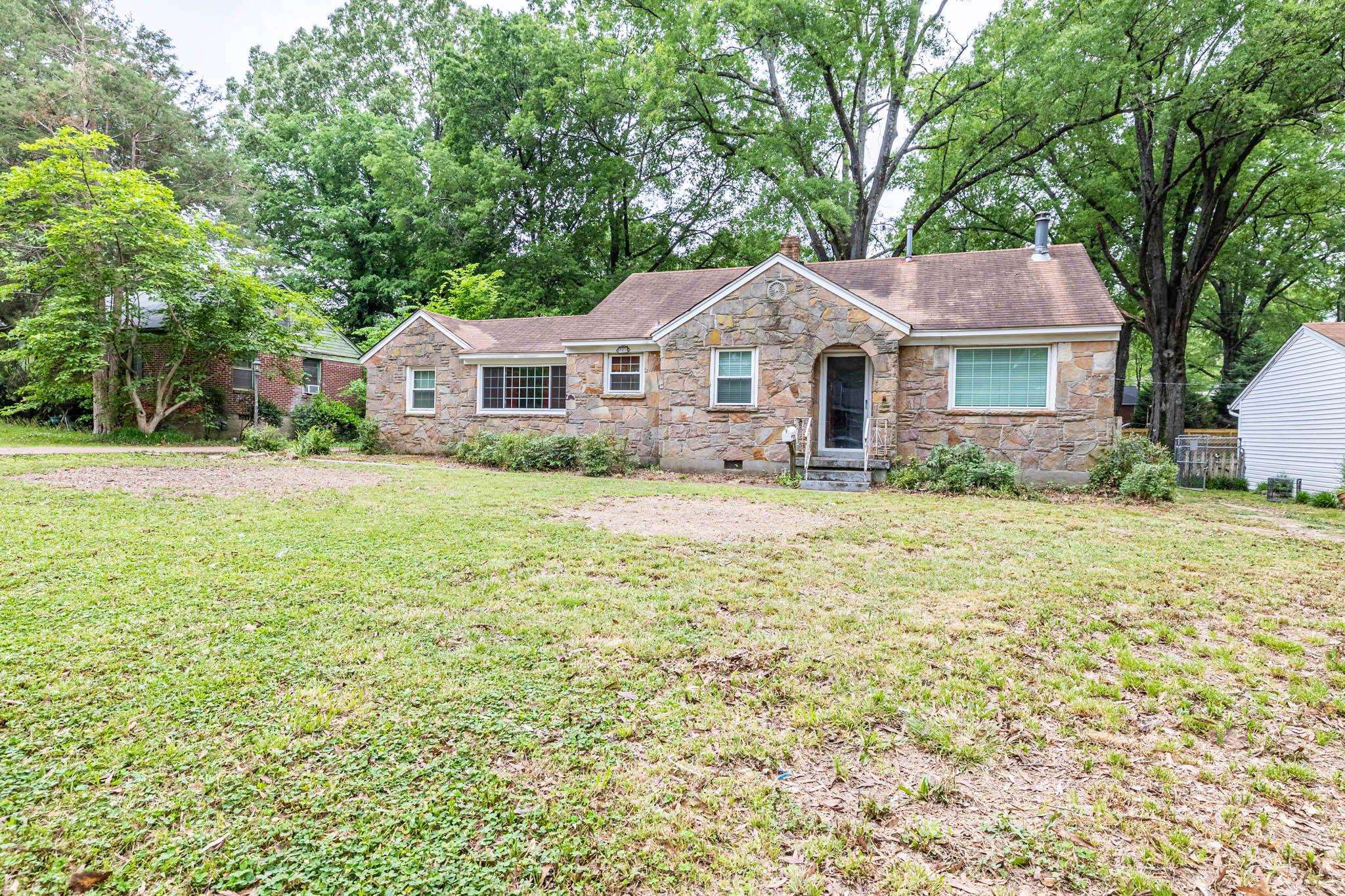 981 Tatum Road Memphis, TN 38122 - Photo 1 of 16 a view of a house with a yard