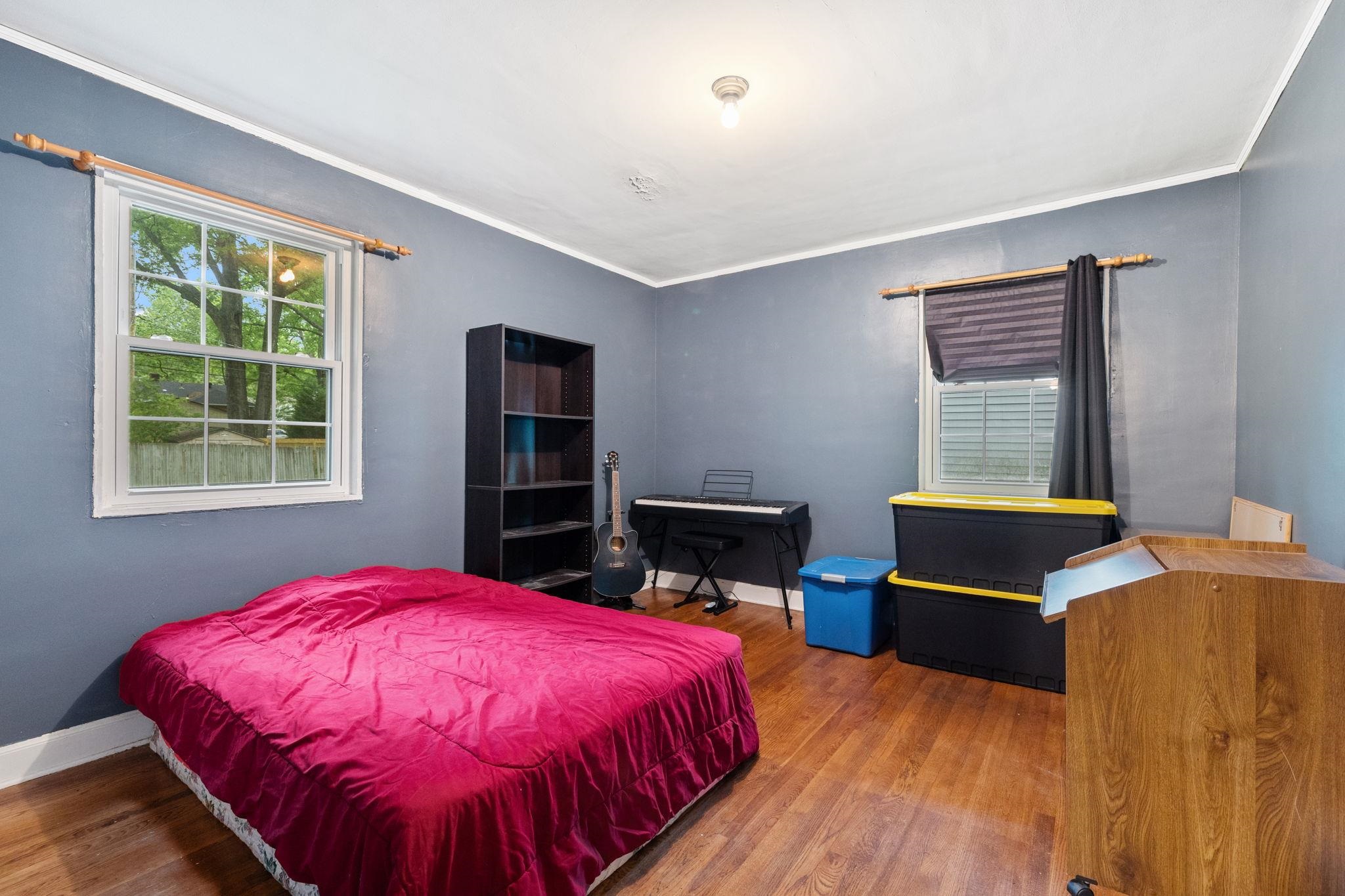 981 Tatum Road Memphis, TN 38122 - Photo 11 of 16 a bed room with a bed and a window