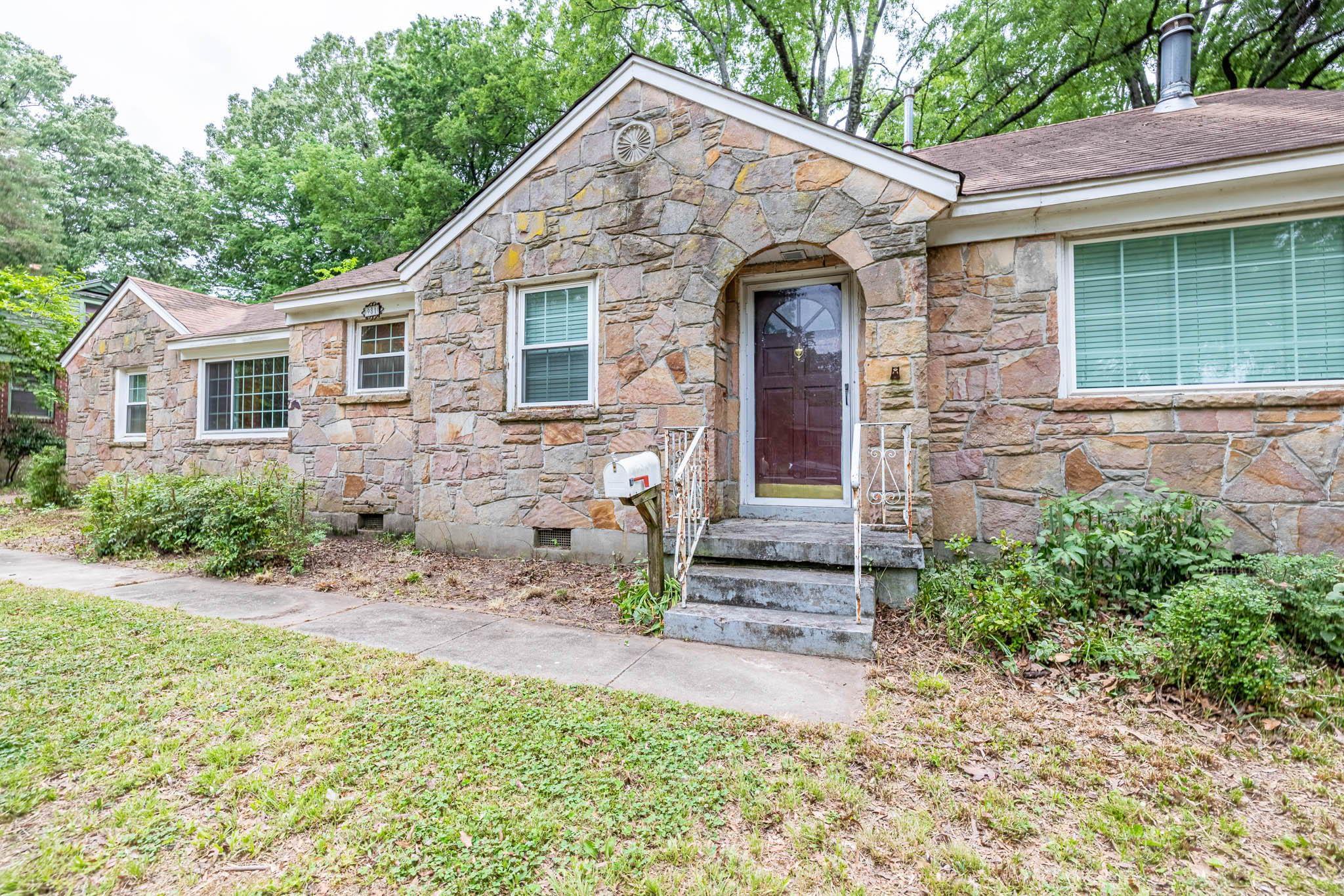 981 Tatum Road Memphis, TN 38122 - Photo 2 of 16 a view of a house with a yard