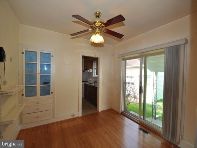 204 Wampler Road Middle River, MD 21220 - Photo 20 of 22 wooden floor in an empty room with a window