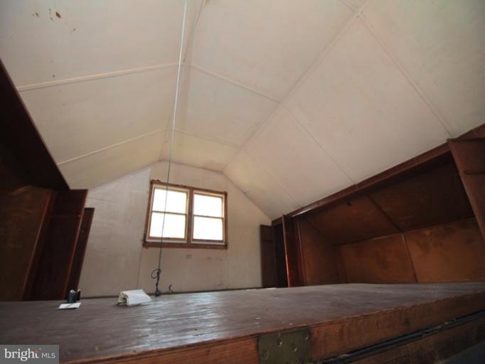 204 Wampler Road Middle River, MD 21220 - Photo 10 of 22 a view of an empty room with wooden floor and a window