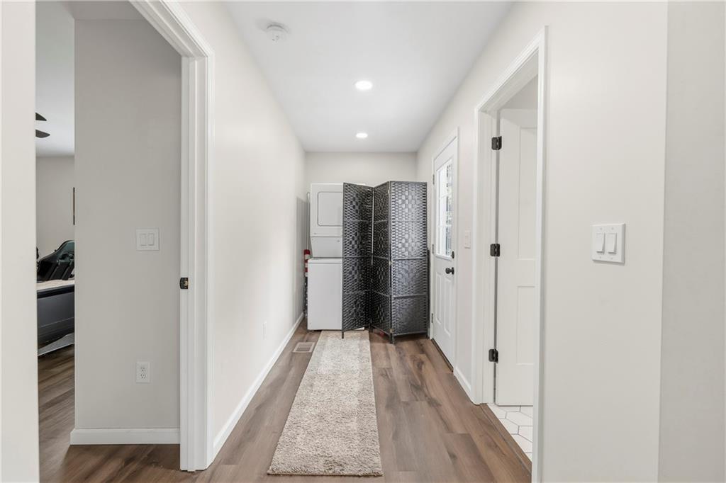 156 Pine Avenue Commerce, GA 30529 - Photo 13 of 35 a view of a hallway with a white walls