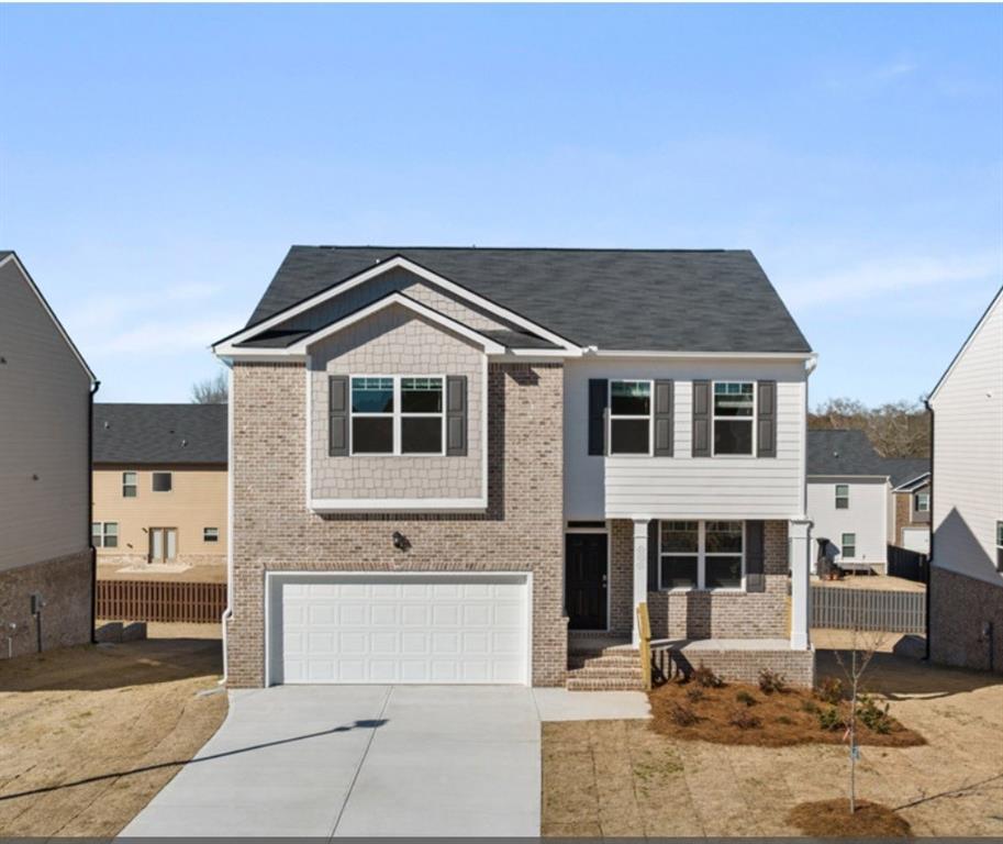652 Whitman Lane Stockbridge, GA 30281 - Photo 1 of 36 a front view of a house with a yard