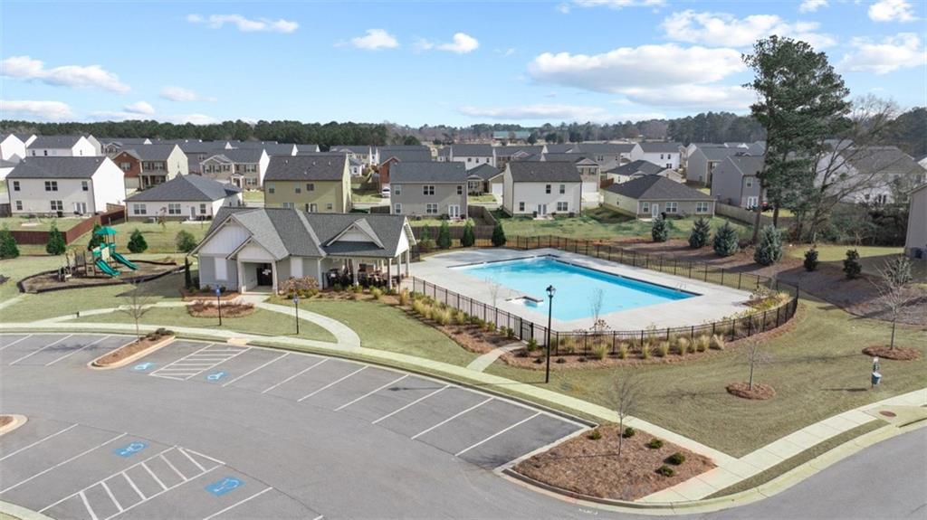 652 Whitman Lane Stockbridge, GA 30281 - Photo 12 of 36 a view of a swimming pool with a lake view