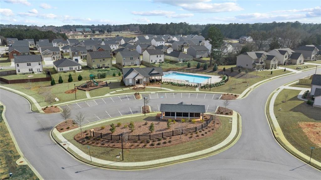 652 Whitman Lane Stockbridge, GA 30281 - Photo 15 of 36 a view of a swimming pool with outdoor seating