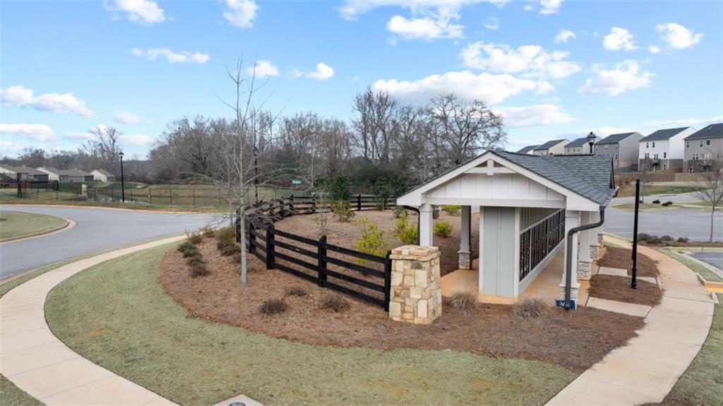652 Whitman Lane Stockbridge, GA 30281 - Photo 17 of 36 a view of a house with a yard